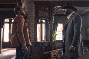 THE HARDER THEY FALL (L to R): JONATHAN MAJORS as NAT LOVE and IDRIS ELBA as RUFUS BUCK in THE HARDER THEY FALL Cr. DAVID LEE/NETFLIX © 2021